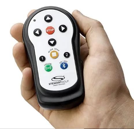 Stewart X9 remote in a man's hand